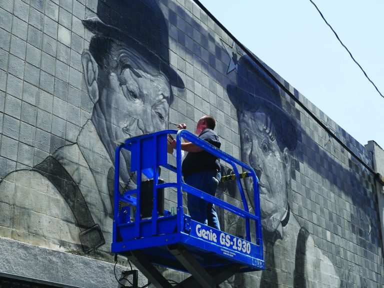 Mural Artist repairs several Culver City works